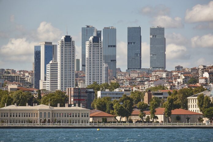Modern Istanbul skyline at sunset over the Bosphorus, representing the city's business and finance opportunities