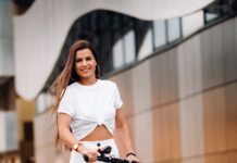 E-Scooters and Bikes in Istanbul: Shared Mobility Guide Young woman riding an electric scooter in a city street