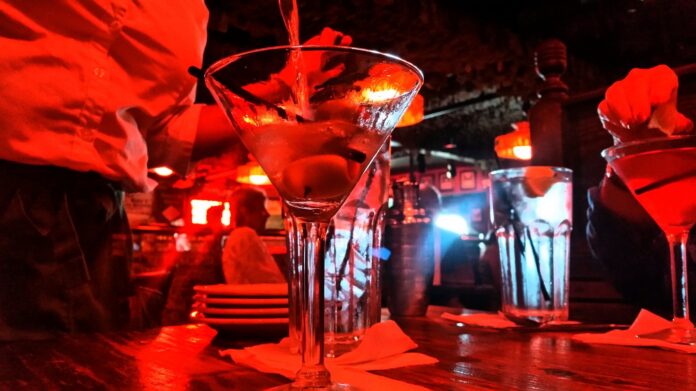 Colourful cocktails at a bar at night, set up for an Istanbul pub crawl