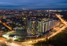 Getting Turkish Citizenship Through Real Estate Investment High-rise residential apartment buildings in Istanbul illuminated at night