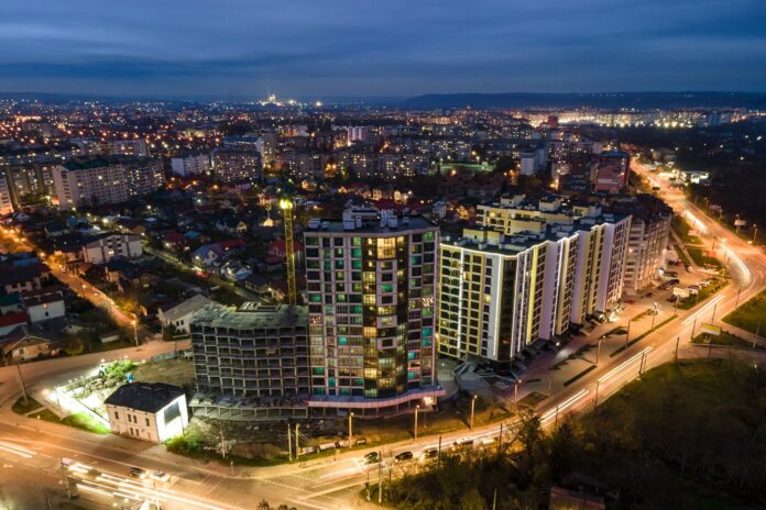 istanbul-real-estate-apartments High-rise residential apartment buildings in Istanbul illuminated at night