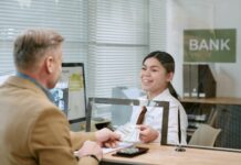 How to Open a Bank Account in Istanbul as a Foreigner Bank teller assisting a customer at a bank counter to open an account