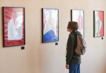 Best Art Exhibitions in Istanbul Right Now: Modern, Contemporary, Photography Visitor looking at abstract art on a gallery wall