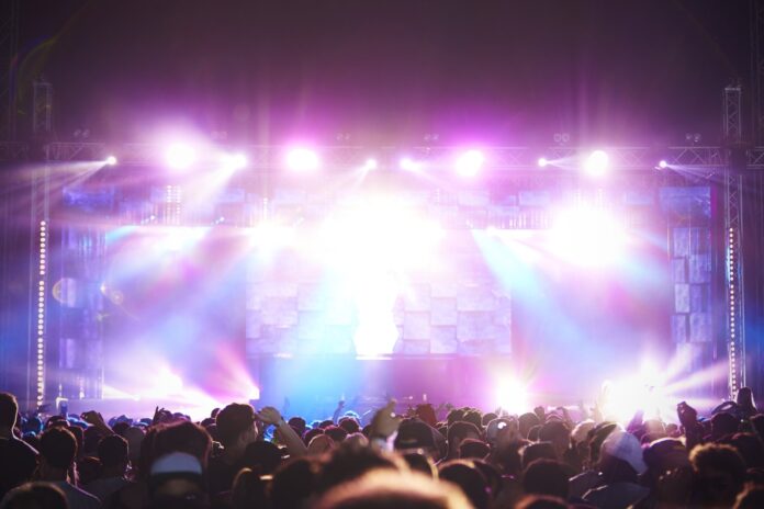 best-concerts-istanbul-venues Concert stage with audience and lights at an Istanbul venue