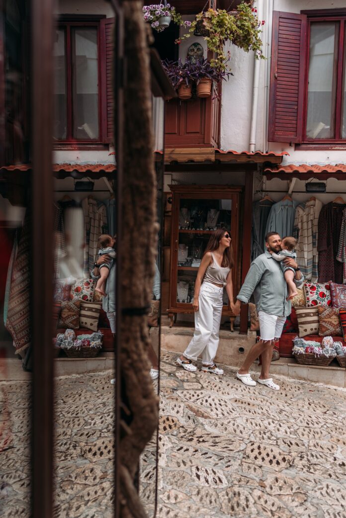 A family walking through a colorful Cihangir-style street in Beyoğlu, Istanbul