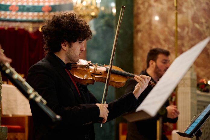 Classical music ensemble performing during a concert
